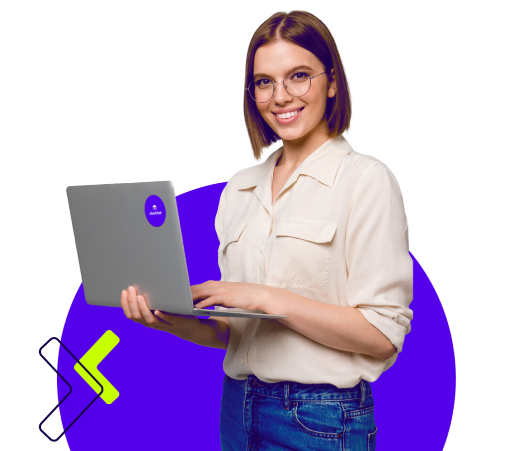 Young woman in glasses and casual wear smiling with laptop, vibrant purple background.